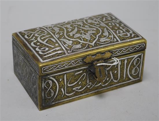 A Cairo ware silver inlaid brass box